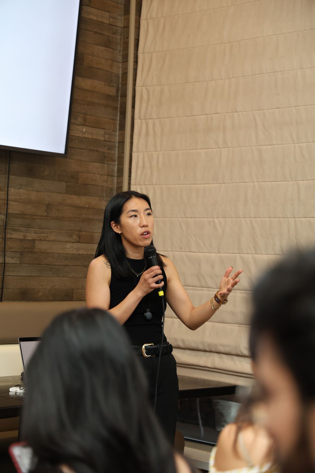Hannah speaking at a 5-9 Builders Club event